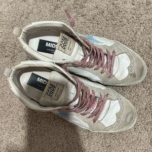 Gently worn golden goose!